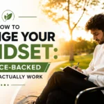 How to change your mindset featured image showing a person journaling at sunrise, symbolizing personal growth and science-backed transformation.